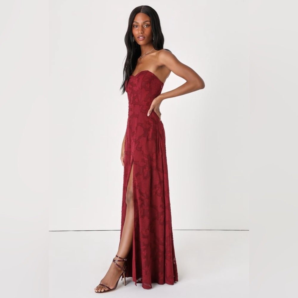 A burgundy red lace prom dress with a slit, zipper side and a supportive bra,